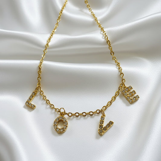 Charm Initiale doré strass